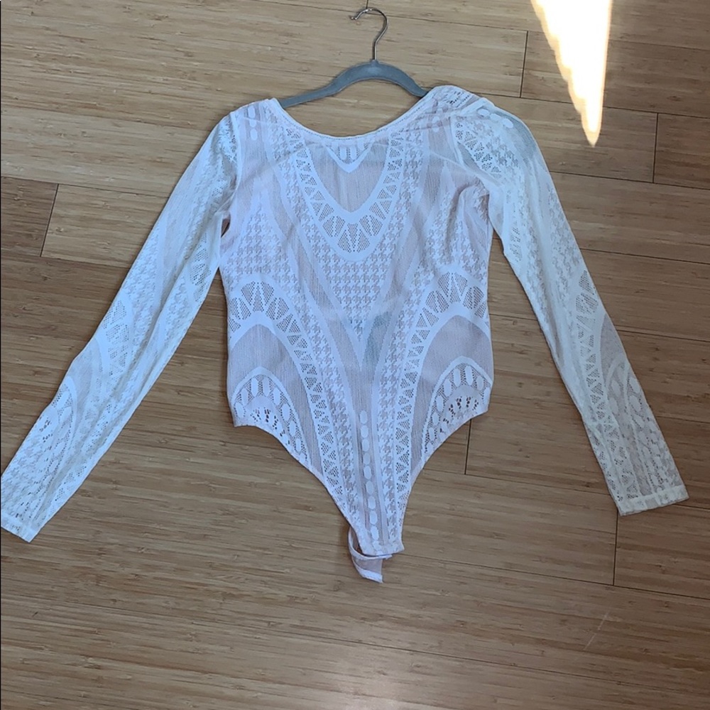 Beautiful BCBG body suit - size small.